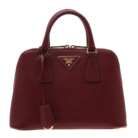 prada maroon bag|Prada handbags.